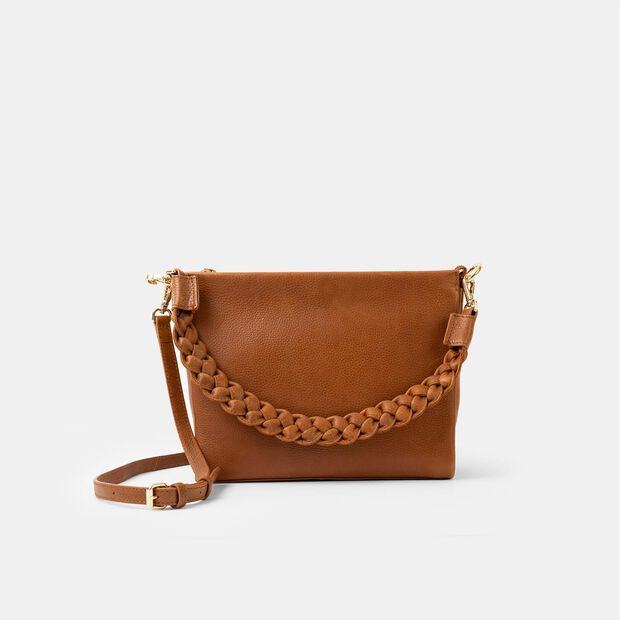 Kožen&aacute; crossbody s extra popruhem, p&iacute;skov&aacute;