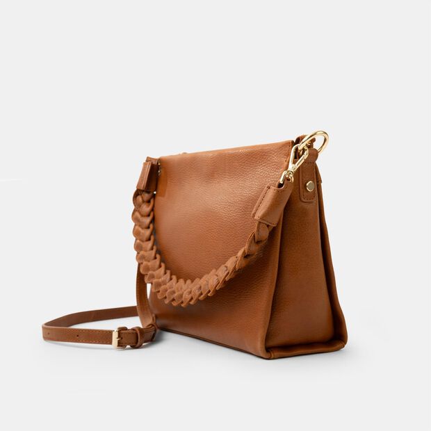 Kožen&aacute; crossbody s extra popruhem, p&iacute;skov&aacute;