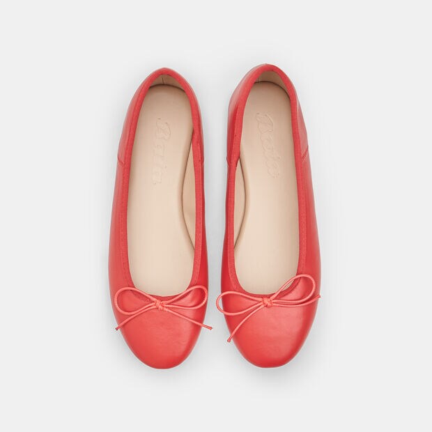Bata women's ballerina flat with black trim and bow, Red