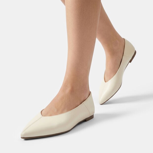 Women's ballerina flat with visible seam on the toe, White