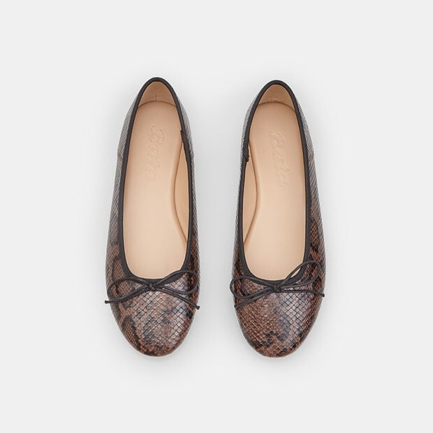 Bata women's ballerina flat with black trim and bow, Brown